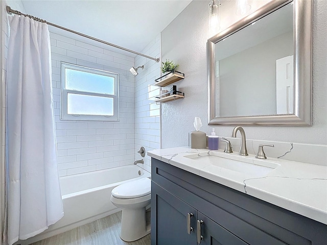 1437 Stonehenge Way, Palm Harbor, FL 34683 - bathroom featuring vanity, shower / bathtub combination with curtain, and a textured wall