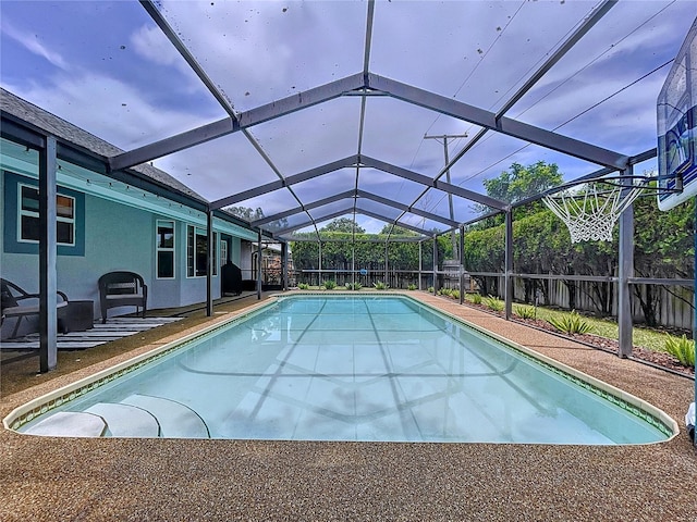 1437 Stonehenge Way, Palm Harbor, FL 34683 - view of pool featuring a fenced backyard, a patio area, and glass enclosure