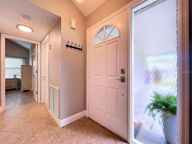 1437 Stonehenge Way, Palm Harbor, FL 34683 - entryway featuring lofted ceiling and light tile patterned flooring