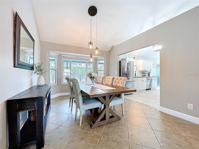 1437 Stonehenge Way, Palm Harbor, FL 34683 - dining area with vaulted ceiling and light tile patterned floors