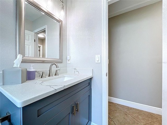 1437 Stonehenge Way, Palm Harbor, FL 34683 - bathroom featuring vanity, tile patterned flooring, and a textured wall