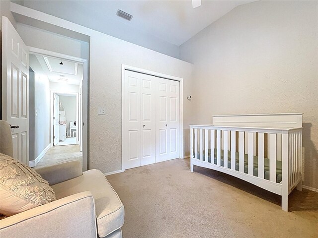 1437 Stonehenge Way, Palm Harbor, FL 34683 - carpeted bedroom featuring a closet, lofted ceiling, attic access, and a ceiling fan