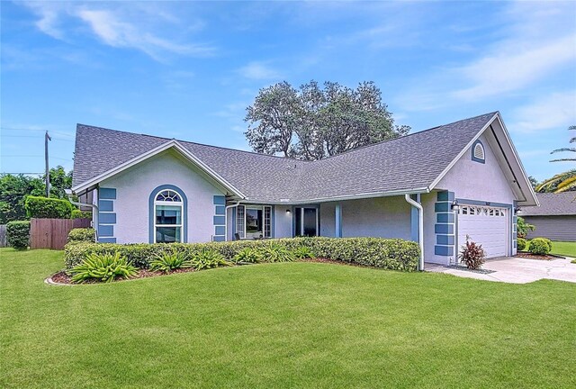 1437 Stonehenge Way, Palm Harbor, FL 34683 - ranch-style house featuring stucco siding, an attached garage, driveway, and a shingled roof
