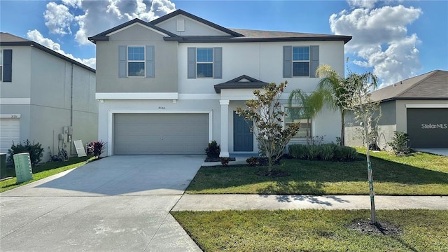 31363 Sun Kettle Loop, Wesley Chapel, FL 33545 - view of front of house featuring stucco siding, an attached garage, a front lawn, and driveway