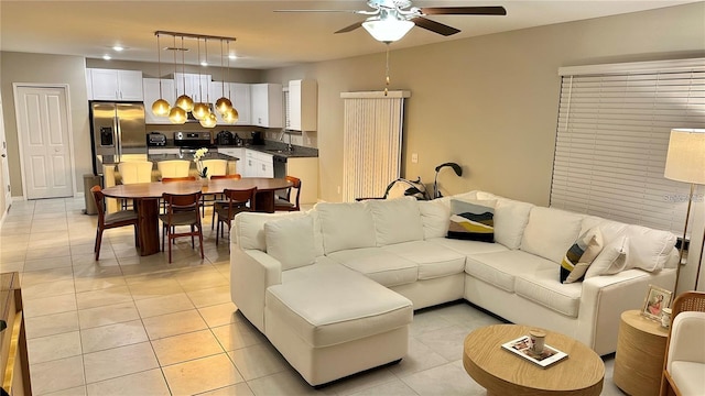 31363 Sun Kettle Loop, Wesley Chapel, FL 33545 - living room with ceiling fan and light tile patterned flooring