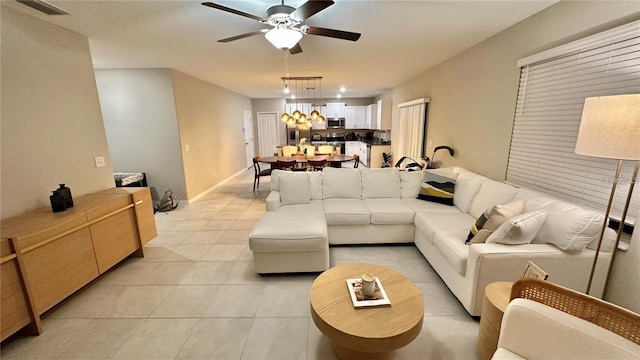 31363 Sun Kettle Loop, Wesley Chapel, FL 33545 - living area with ceiling fan and light tile patterned flooring