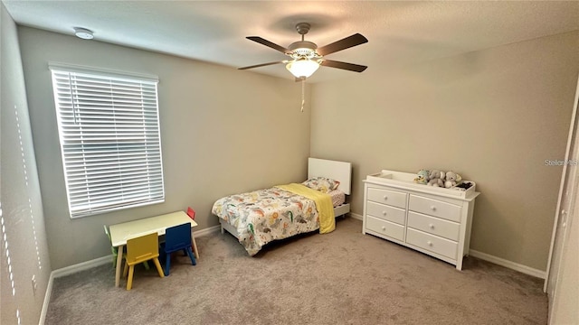 31363 Sun Kettle Loop, Wesley Chapel, FL 33545 - carpeted bedroom with a ceiling fan and baseboards
