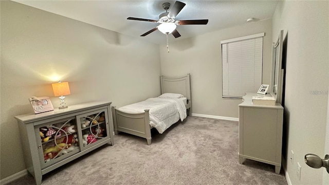 31363 Sun Kettle Loop, Wesley Chapel, FL 33545 - carpeted bedroom with baseboards and a ceiling fan