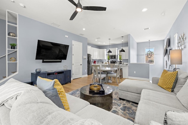 4311 W Fig St Unit 1, Tampa, FL 33609 - living room featuring a ceiling fan, light wood-style floors, and recessed lighting