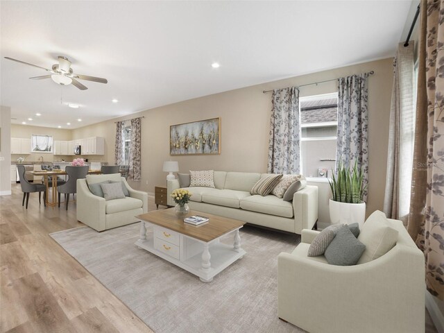 239 Burbank Ave, Lakeland, FL 33801 - living area with light wood-style flooring, a ceiling fan, plenty of natural light, and recessed lighting