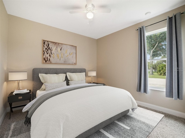 239 Burbank Ave, Lakeland, FL 33801 - bedroom with carpet flooring and a ceiling fan
