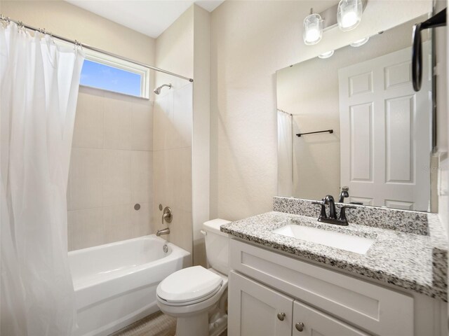 239 Burbank Ave, Lakeland, FL 33801 - bathroom with shower / bath combo with shower curtain and vanity