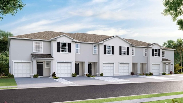 8098 Swan Mist Way, Wesley Chapel, FL 33545 - townhome / multi-family property featuring stucco siding, a garage, and concrete driveway