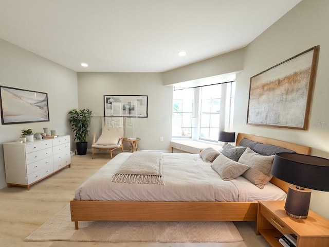 11653 Orleans Ln, Port Richey, FL 34668 - bedroom featuring light wood-type flooring and recessed lighting
