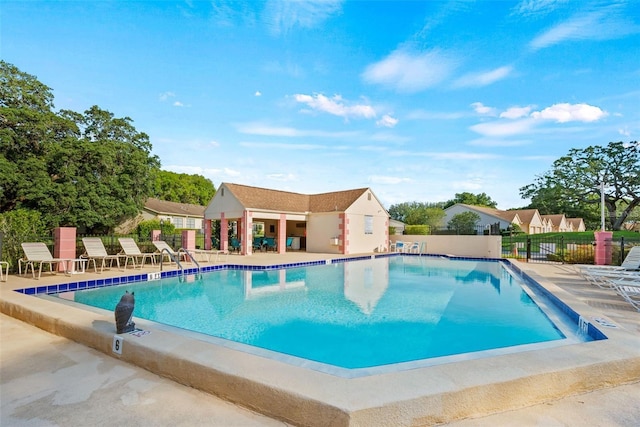 11653 Orleans Ln, Port Richey, FL 34668 - community pool featuring a patio area
