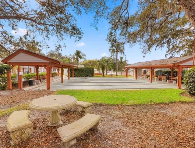 11653 Orleans Ln, Port Richey, FL 34668 - view of community featuring shuffleboard and a gazebo