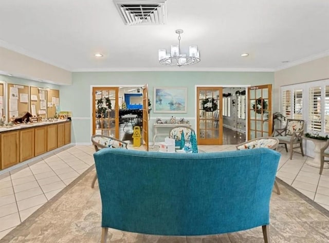 11653 Orleans Ln, Port Richey, FL 34668 - living area with french doors, a chandelier, ornamental molding, light tile patterned flooring, and recessed lighting