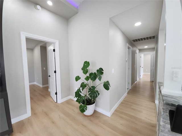 11653 Orleans Ln, Port Richey, FL 34668 - hall with light wood-style flooring and recessed lighting