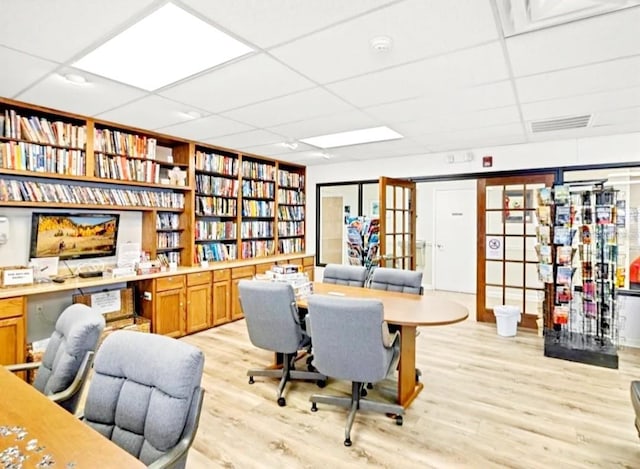 11653 Orleans Ln, Port Richey, FL 34668 - office featuring a drop ceiling and light wood-style flooring