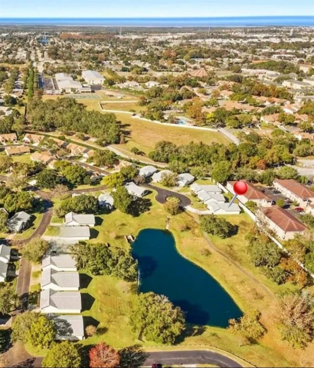 11653 Orleans Ln, Port Richey, FL 34668 - aerial perspective of suburban area with a large body of water