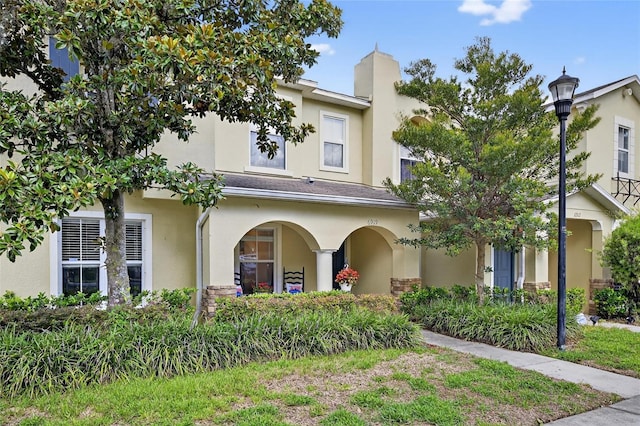 6919 Hawthorne Trace Ln, Riverview, FL 33578 - view of property with stucco siding and a chimney