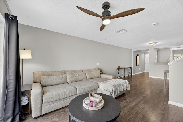 6919 Hawthorne Trace Ln, Riverview, FL 33578 - living room with a ceiling fan, wood finished floors, and a textured ceiling