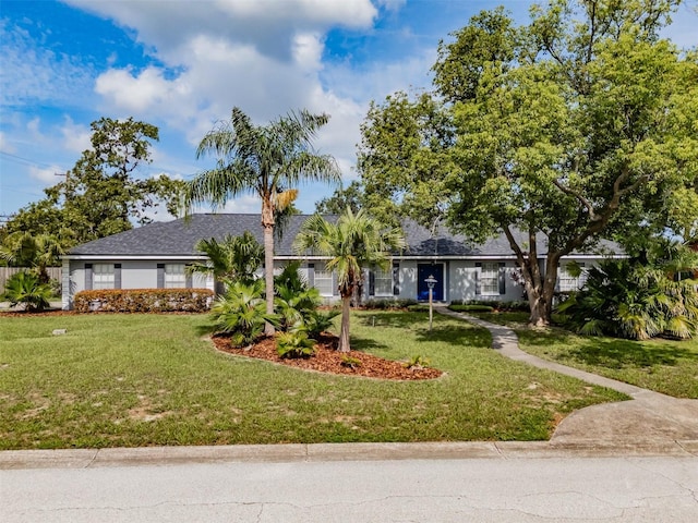 1302 Ivywood Dr, Brandon, FL 33510 - ranch-style house featuring a front lawn
