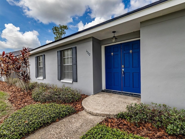1302 Ivywood Dr, Brandon, FL 33510 - property entrance with stucco siding