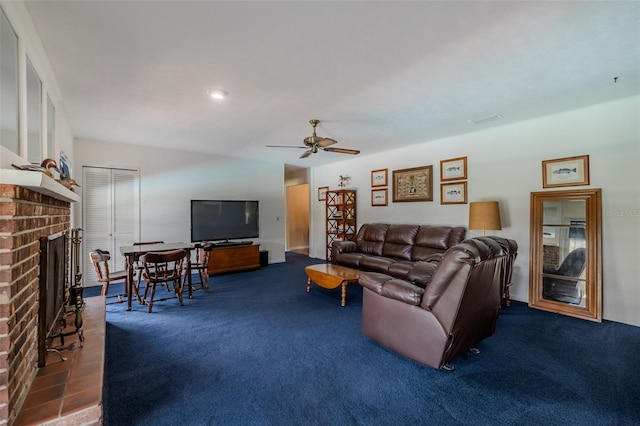 1302 Ivywood Dr, Brandon, FL 33510 - living room with dark colored carpet, a fireplace, and a ceiling fan