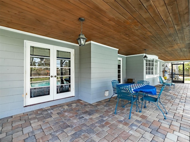 1302 Ivywood Dr, Brandon, FL 33510 - view of patio with french doors and outdoor dining space