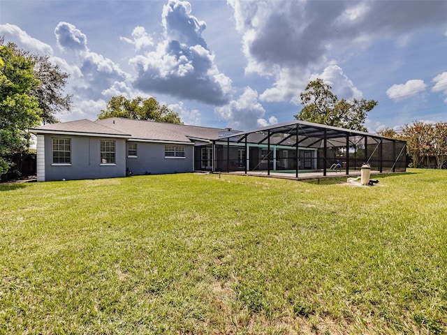 1302 Ivywood Dr, Brandon, FL 33510 - view of grassy yard with a lanai and a pool