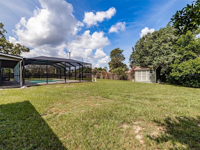 1302 Ivywood Dr, Brandon, FL 33510 - view of yard with a storage shed, a lanai, and an outdoor pool