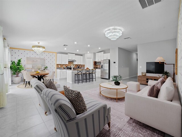 13646 Wild Ginger St, Riverview, FL 33579 - living area featuring a chandelier, light tile patterned floors, and recessed lighting