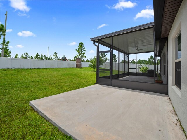 13646 Wild Ginger St, Riverview, FL 33579 - view of yard with a patio, a sunroom, and a ceiling fan