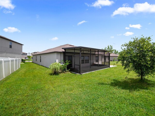 13646 Wild Ginger St, Riverview, FL 33579 - back of house featuring a sunroom