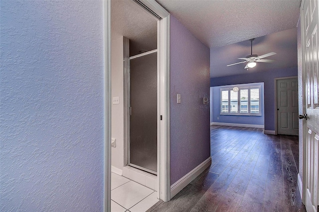 14865 Seminole Trl, Seminole, FL 33776 - corridor with a textured wall, hardwood / wood-style floors, a textured ceiling, and vaulted ceiling