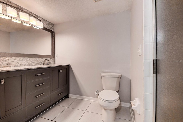 14865 Seminole Trl, Seminole, FL 33776 - bathroom featuring tile patterned floors, vanity, and a textured ceiling