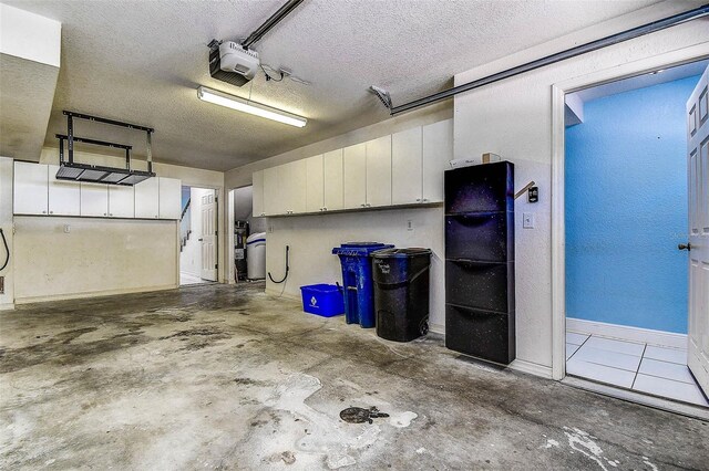 14865 Seminole Trl, Seminole, FL 33776 - garage with a garage door opener and baseboards