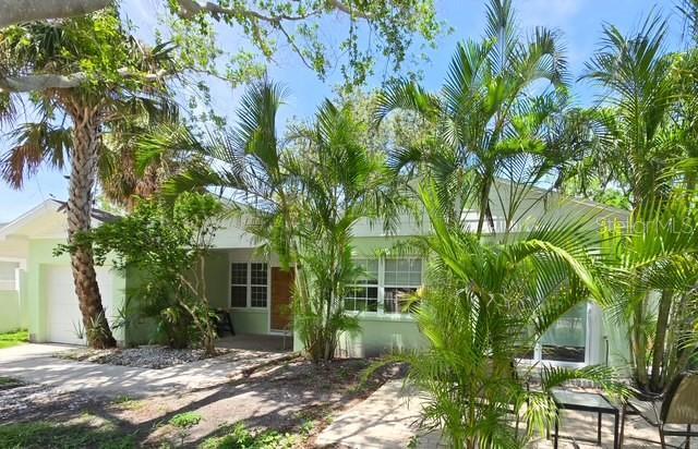 750 Bay Esplanade, Clearwater Beach, FL 33767 - view of side of home featuring a garage