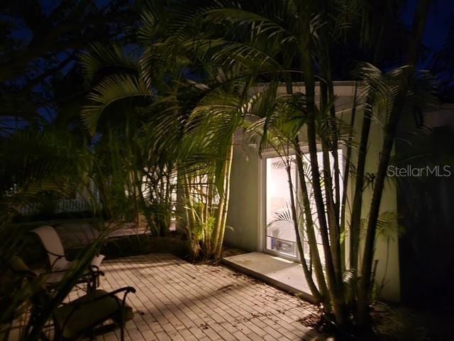 750 Bay Esplanade, Clearwater Beach, FL 33767 - view of patio at twilight