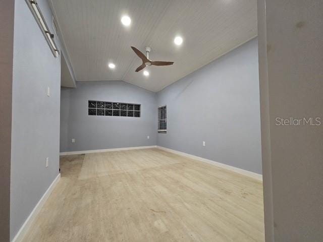 750 Bay Esplanade, Clearwater Beach, FL 33767 - unfurnished room featuring a ceiling fan, lofted ceiling, wood finished floors, and recessed lighting