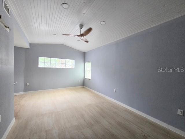 750 Bay Esplanade, Clearwater Beach, FL 33767 - empty room with wood finished floors, ceiling fan, lofted ceiling, and wooden ceiling