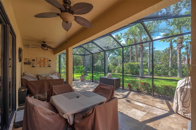 321 Silver Falls Dr, Apollo Beach, FL 33572 - sunroom / solarium featuring a ceiling fan, outdoor lounge area, view of scattered trees, and outdoor dining area