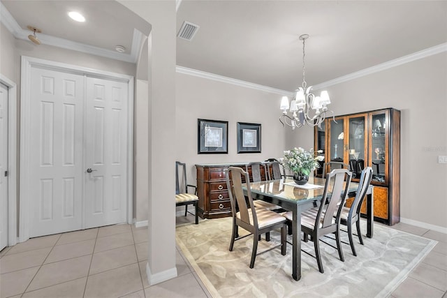 321 Silver Falls Dr, Apollo Beach, FL 33572 - dining room featuring light tile patterned floors, a chandelier, and crown molding