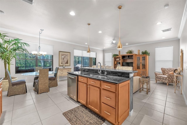 321 Silver Falls Dr, Apollo Beach, FL 33572 - kitchen with stainless steel dishwasher, a chandelier, light tile patterned floors, an island with sink, and recessed lighting