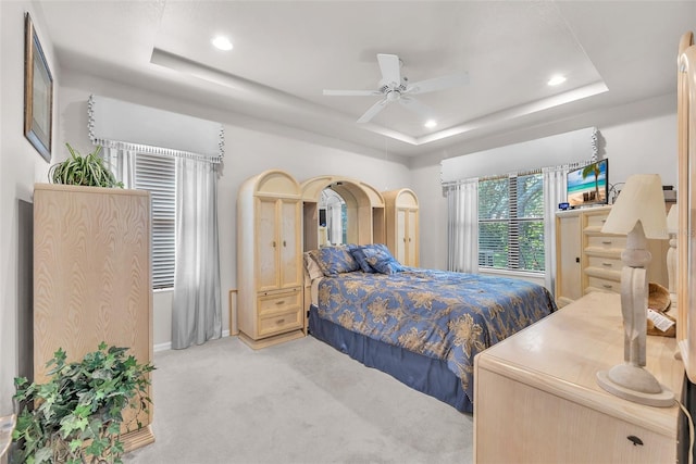 321 Silver Falls Dr, Apollo Beach, FL 33572 - carpeted bedroom with a raised ceiling, recessed lighting, and a ceiling fan