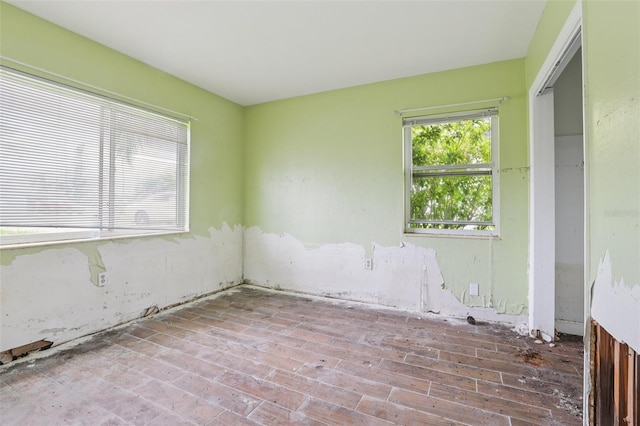 16033 Redington Dr, Redington Beach, FL 33708 - empty room with wood finished floors