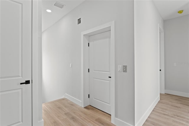 11605 1st St E Unit 2, Treasure Island, FL 33706 - hall featuring light wood finished floors and recessed lighting