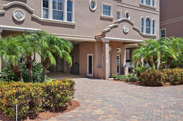 2756 Reserve Ct, Dunedin, FL 34698 - view of front facade featuring stucco siding