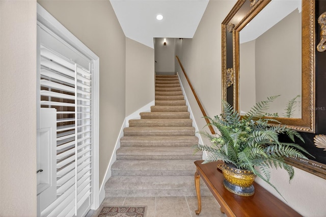 2756 Reserve Ct, Dunedin, FL 34698 - stairs featuring tile patterned floors and recessed lighting